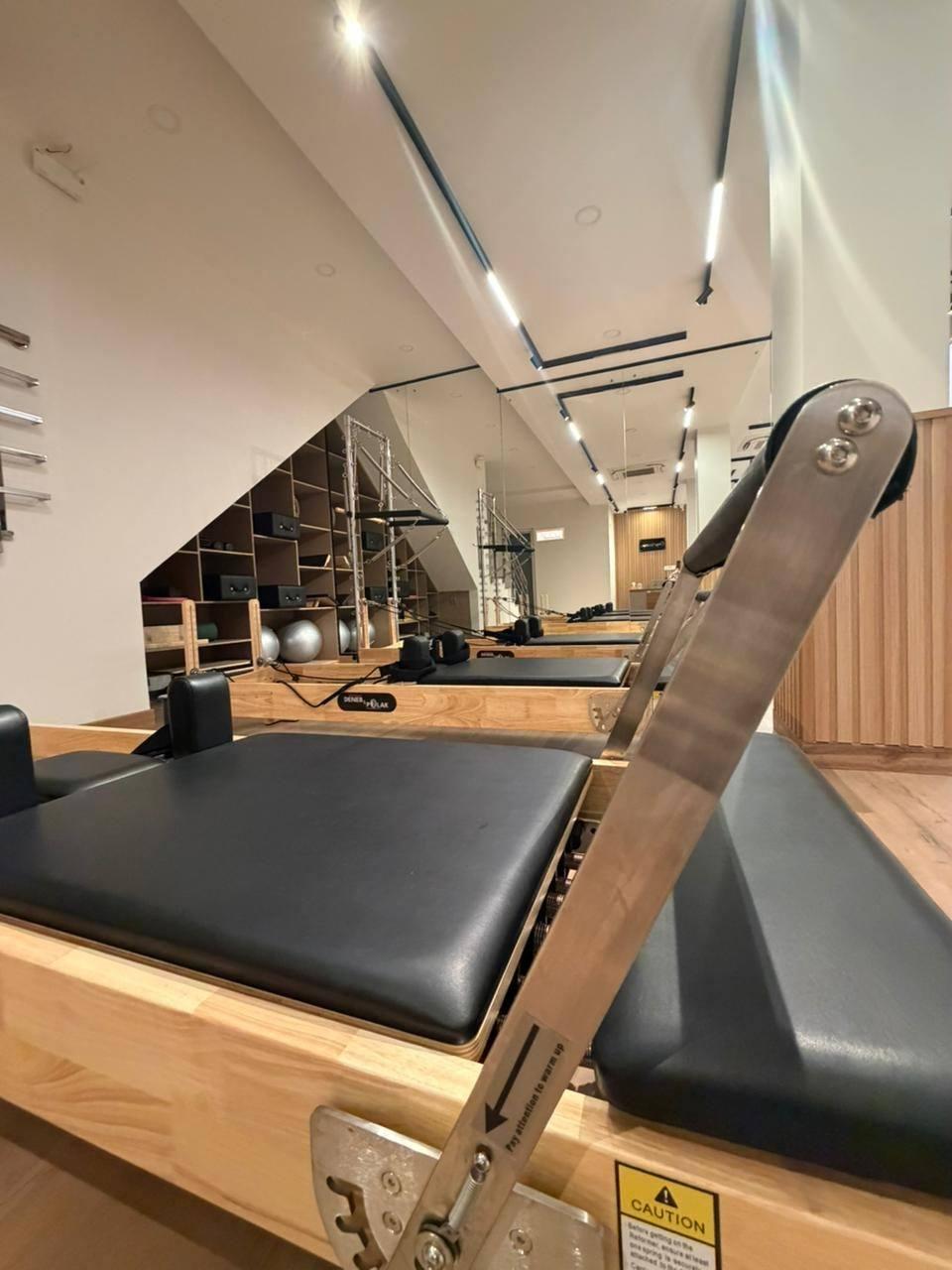 Close-up of reformer equipment in the Carry Wellness Pilates studio